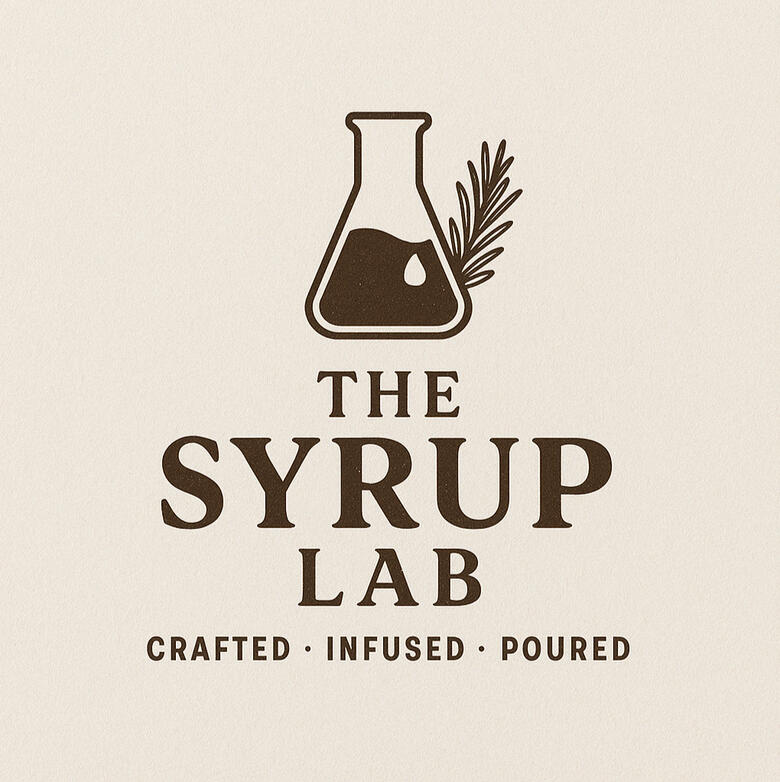 The Syrup Lab logo featuring a beaker with liquid and a rosemary sprig, along with the tagline "Crafted • Infused • Poured."